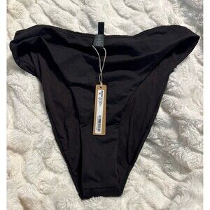 Skims Mid Coverage Swim Bottoms. Brand new with tags. Color Onyx. Size small